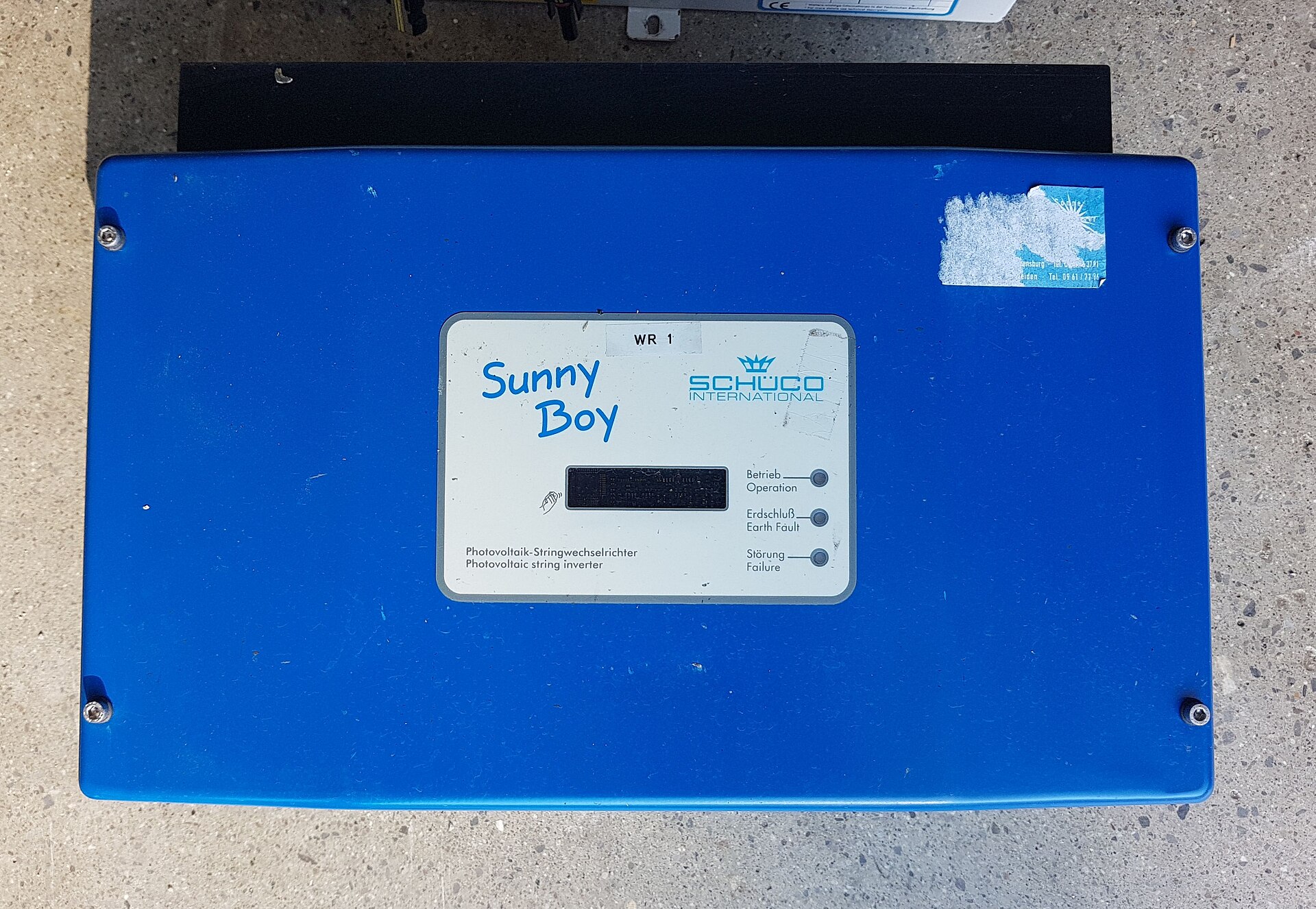 A wall-mounted Sunny Boy photovoltaic string inverter; illustrative equipment example.