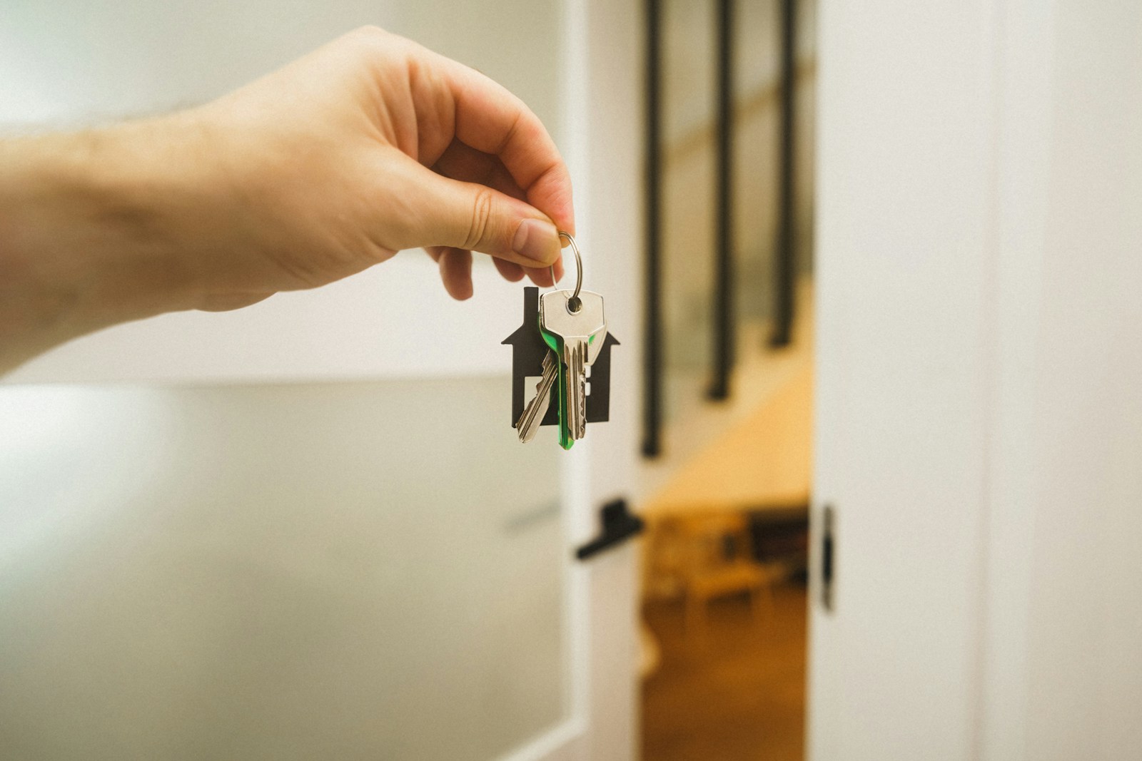 Keys at a domestic entrance; moving-home context.
