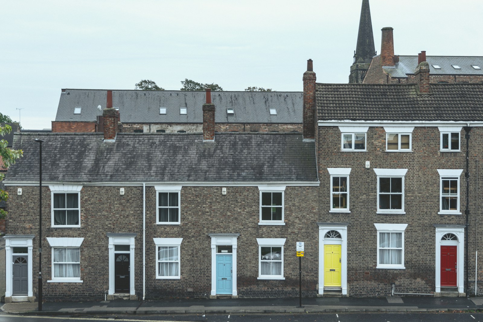 Brick terraced houses with slate and tiled roofs; property context.